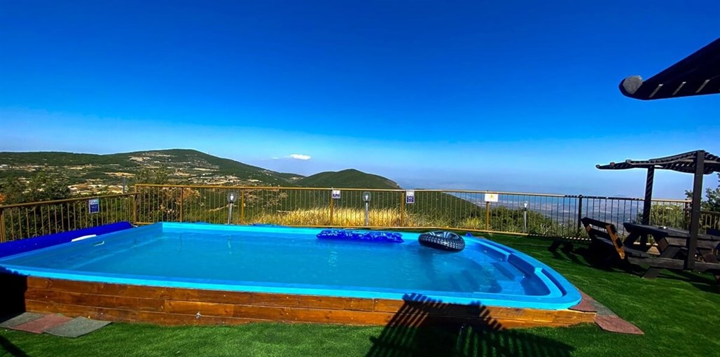 בקתות עץ בין העננים הבריכה והנוף (4).jpeg