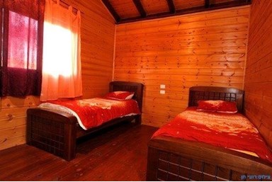 מרום הכרמל - בקתות העץ