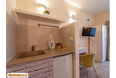 כפר הנופש אלמוג - חדרי נחל אוג