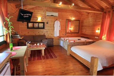 הצימר של צימוקי - בקתות העץ