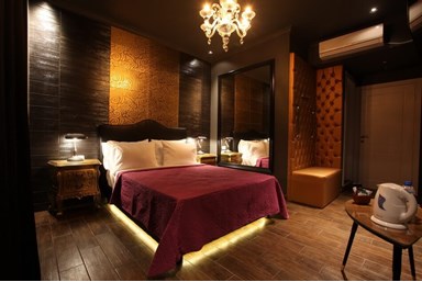 מלון טוקן - חדרי האירוח