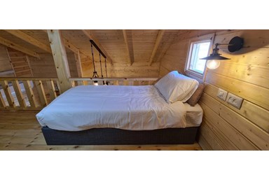 וידה בחרמון - בקתת עץ משפחתית