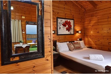 שלוות הכנרת - בקתות העץ