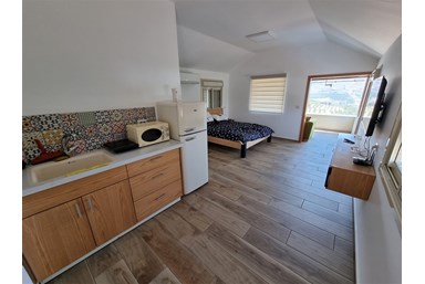 NH Suites - סוויטת הקומה העליונה